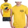 Camiseta amarilla España Campeones del Mundo 2026 con diseño de toro y capote, estampada en pecho y espalda.